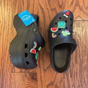 Platform Crocs Size 6 with multiple Jibbitz